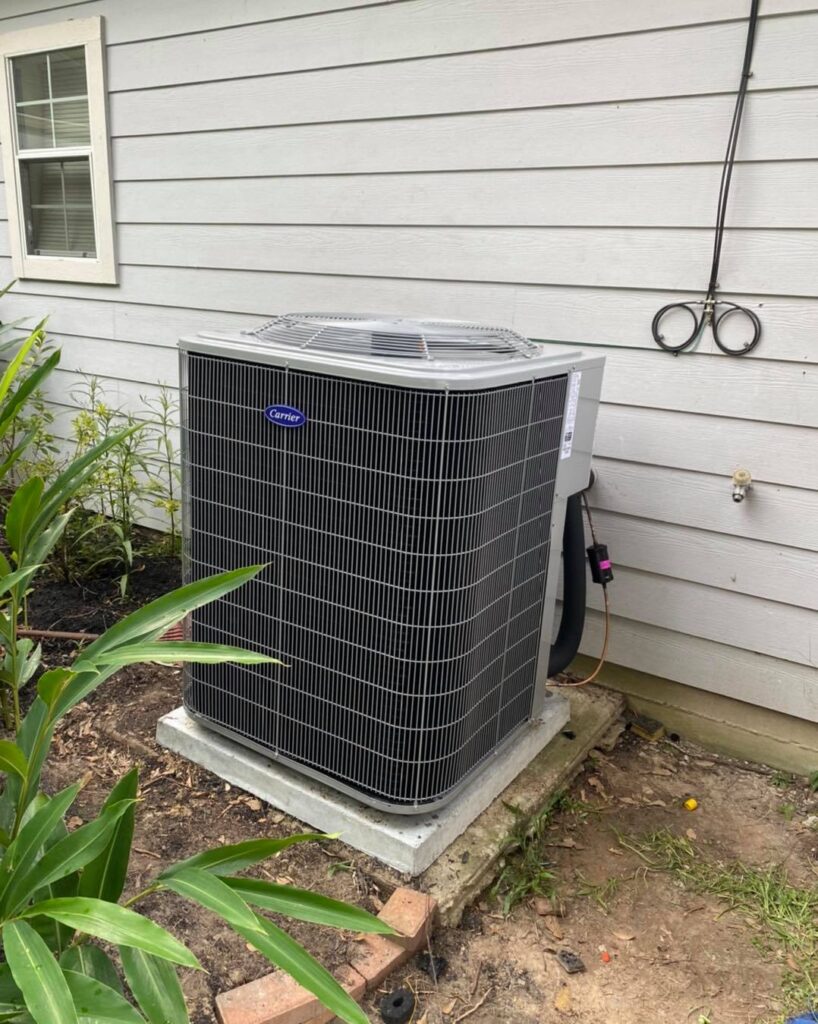 Global Air Service technician inspecting HVAC unit with gauges and safety gear